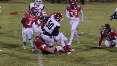 Tigers honor seniors with big win to grab share of district 1-2A title