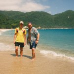 two men on a tropical beach