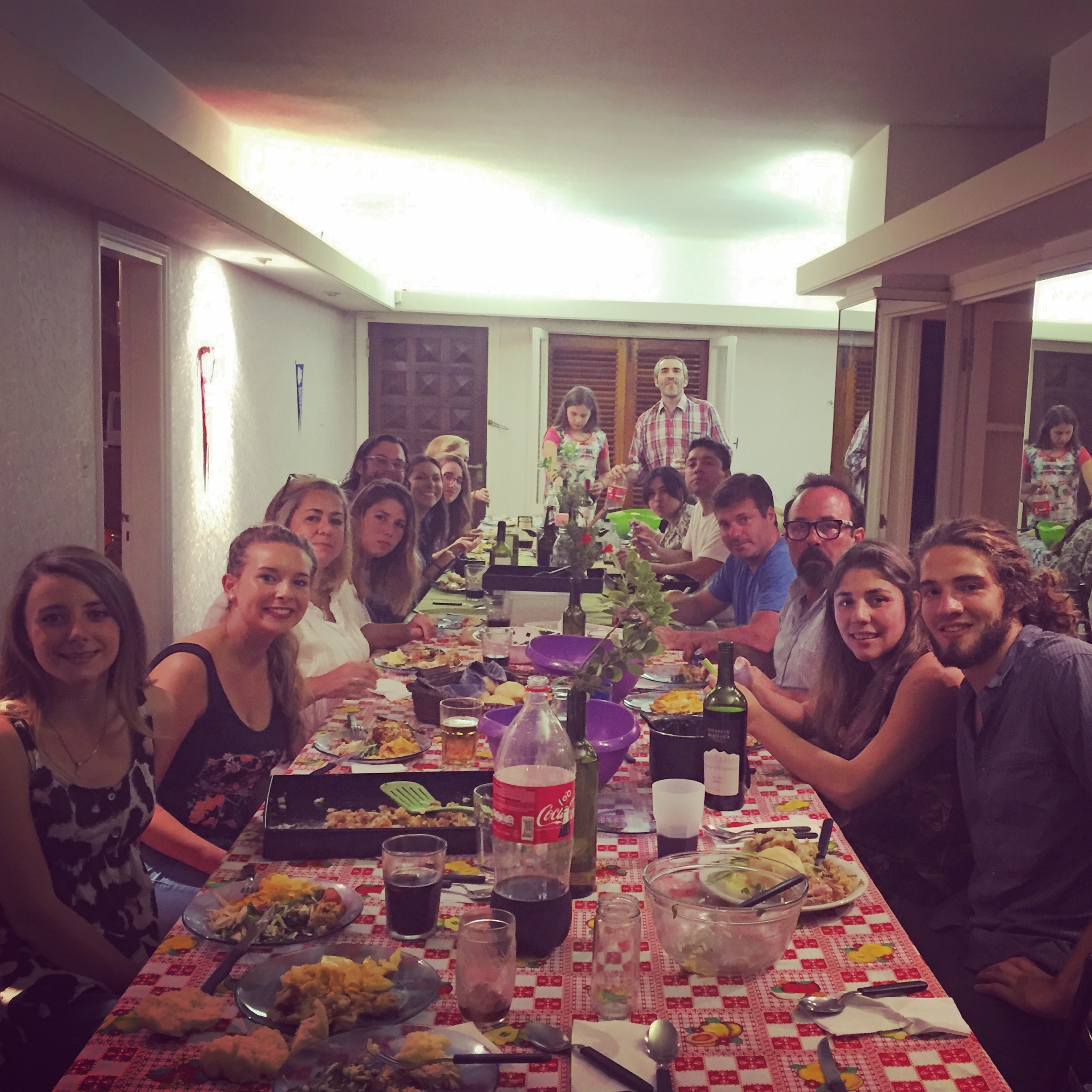 Three tables joined together for the biggest Thanksgiving table any of us had ever eaten at
