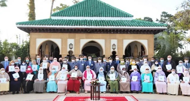 تسليم شهادت ملكية مساكن لذوي حقوق شهداء الوحدة الترابية للمملكة.