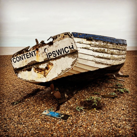 Fishing boat on a shingle beach