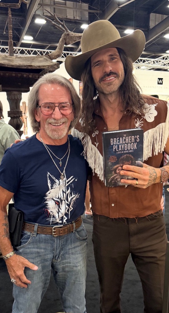 photo of James Pomerantz and internationally renowned Western artist Mark Maggiori