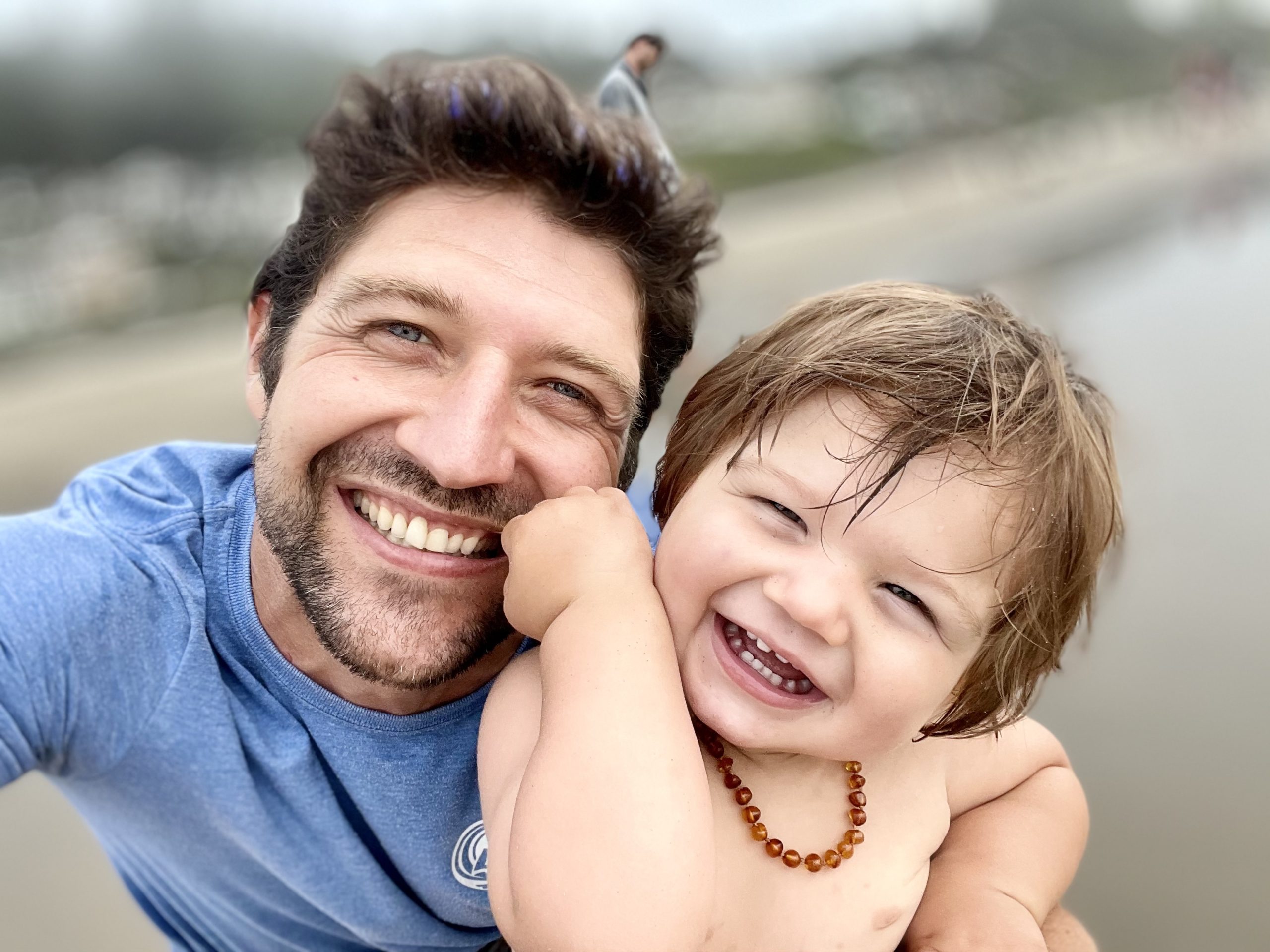 boy with father laughing