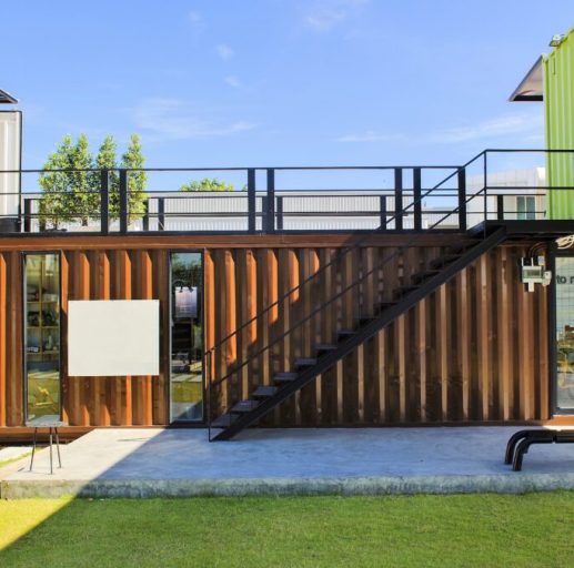 Modern shipping container home with rooftop deck