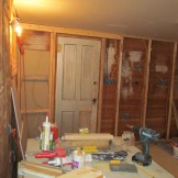 Flushed out the south wall of east bedroom