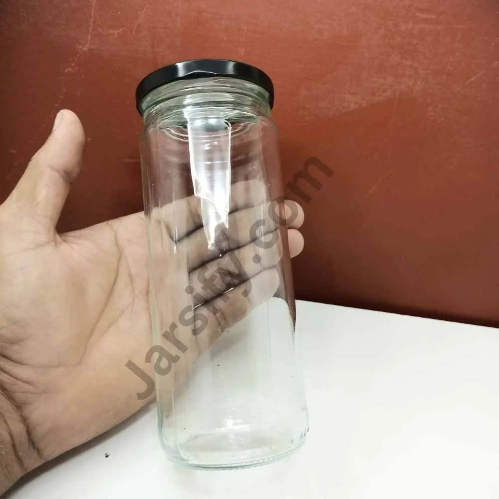 Slim round 450ml glass jar with black lid by Jarsify, ideal for storing nuts and dry foods.