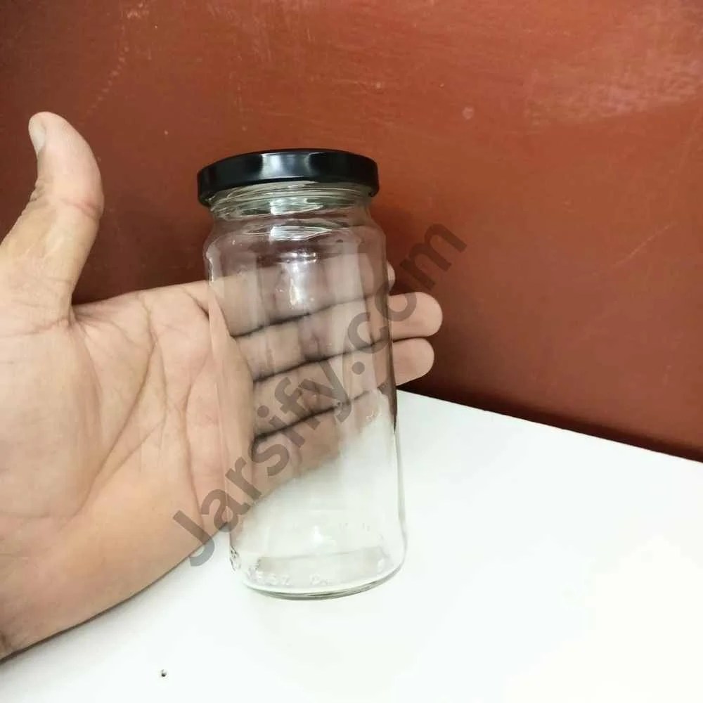 glass storage jar with black cap for dry fruits, nuts, and snacks
