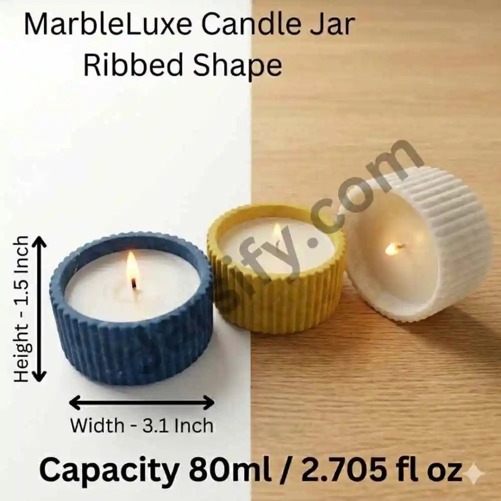 Marble Luxe ribbed candle jars in blue, yellow, and white, and multi color made from solid marble powder, shown with lit candle flames on a split white and wood background.
