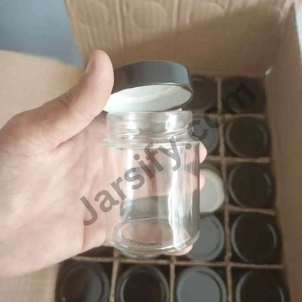 100ml Empty Glass Honey Jars with Black Metal Lids on a White Background, One Vertical and One Horizontal, with Text Overlays for 2.5 Inch Height and 2.5 Inch Diameter Dimensions and the Jarsify.com