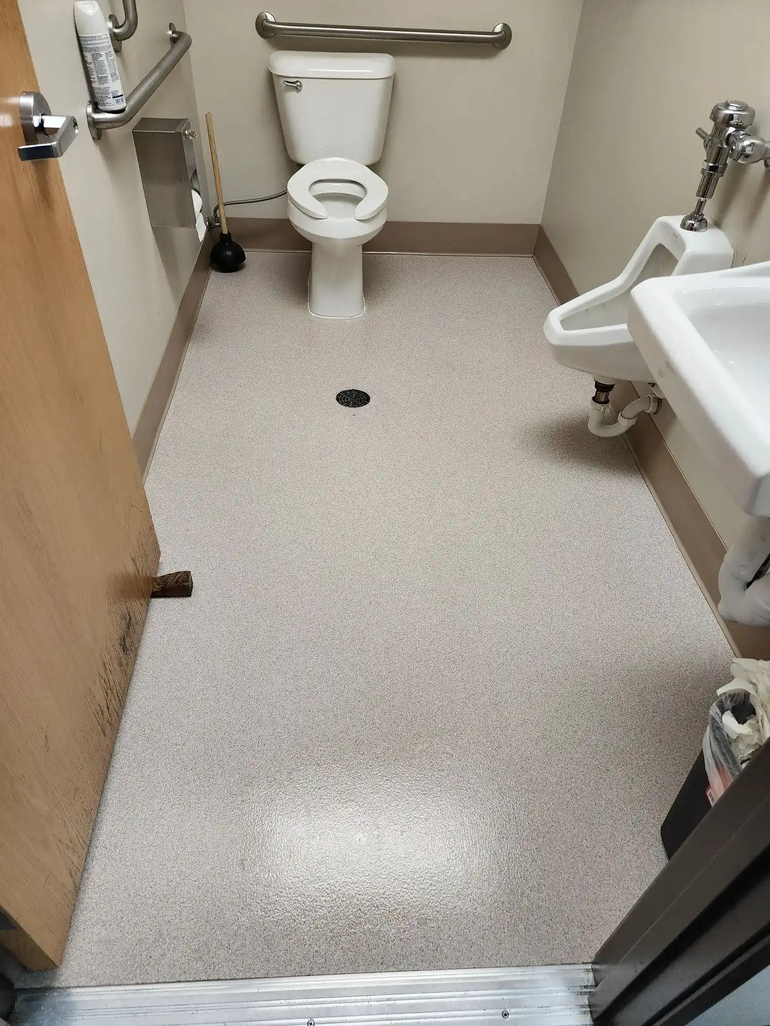 Sanitized commercial restroom facility cleaned under a contract janitorial program in Midland, MI
