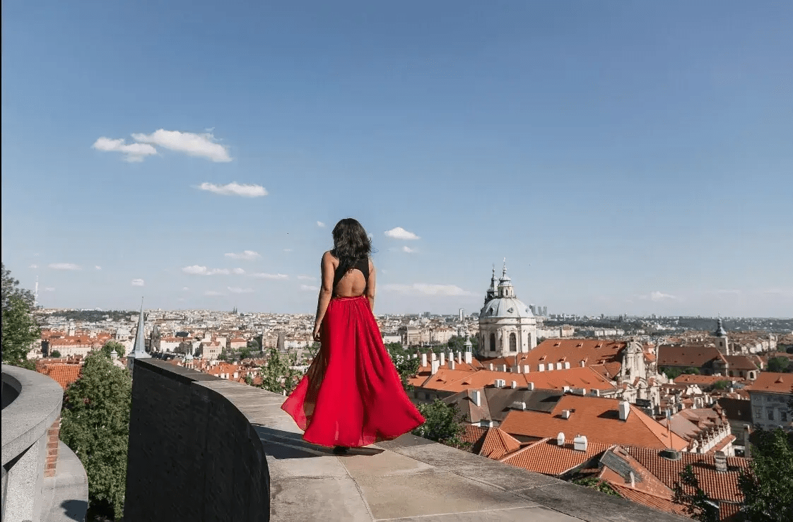 girl outside with back turned to camera