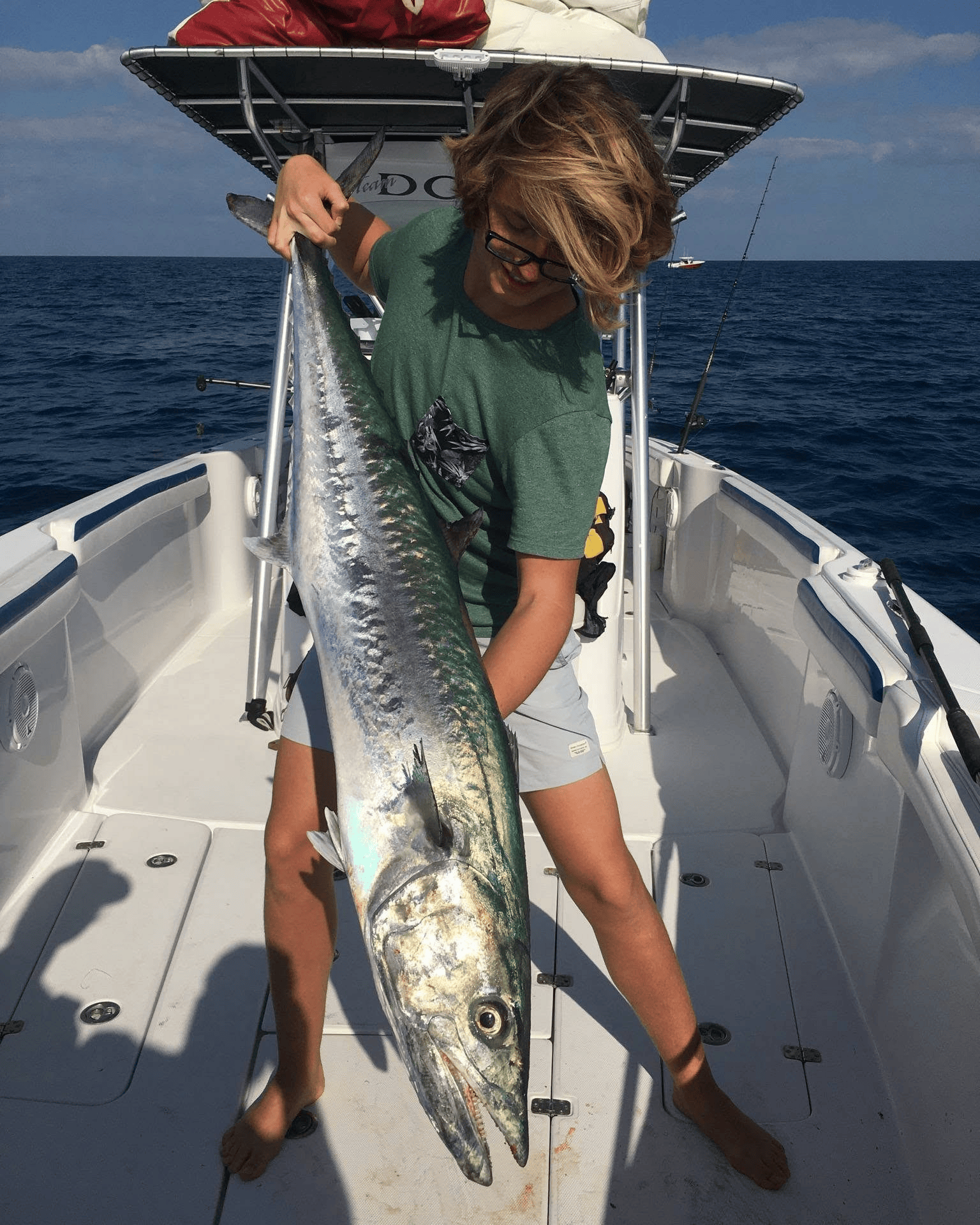 David fishing during his teenage years aboard JawsToo Fishing Charters