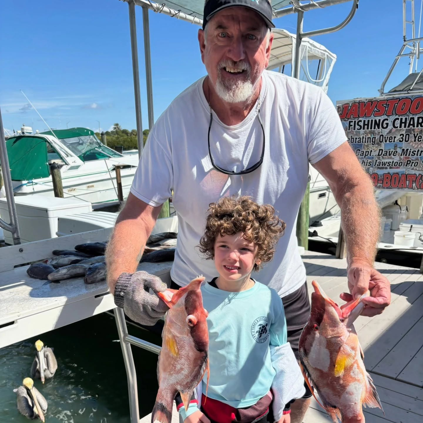 Captain Dave Mistretta with a young JawsToo fishing guest