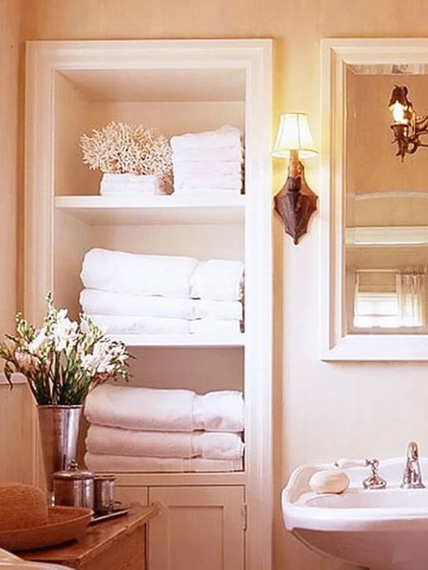 Bathroom essentials tucked away in a between studs cabinet.