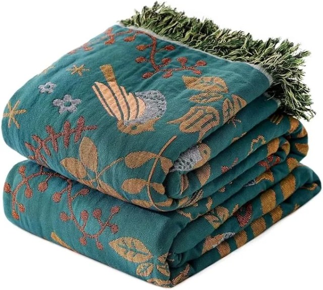 Bold and colorful boho throw blanket with nature inspired print – Amazon link.
