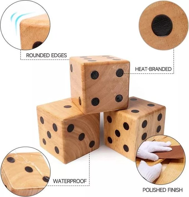 large dice from outdoor Yahtzee  game used as decor on living room shelves