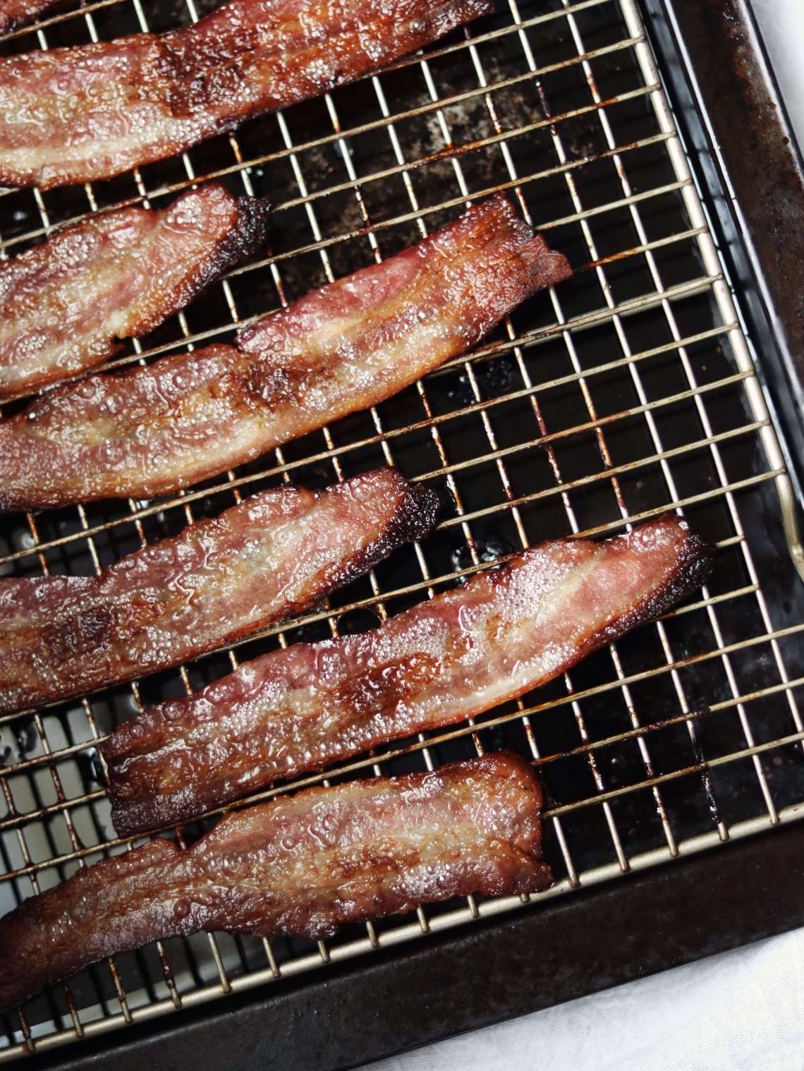 cooked bacon a baking pan