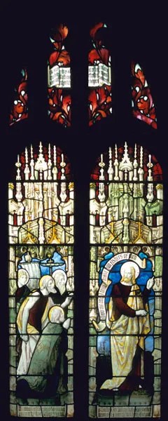 A two light stained glass window depicting the class of the fishermen as disciples.