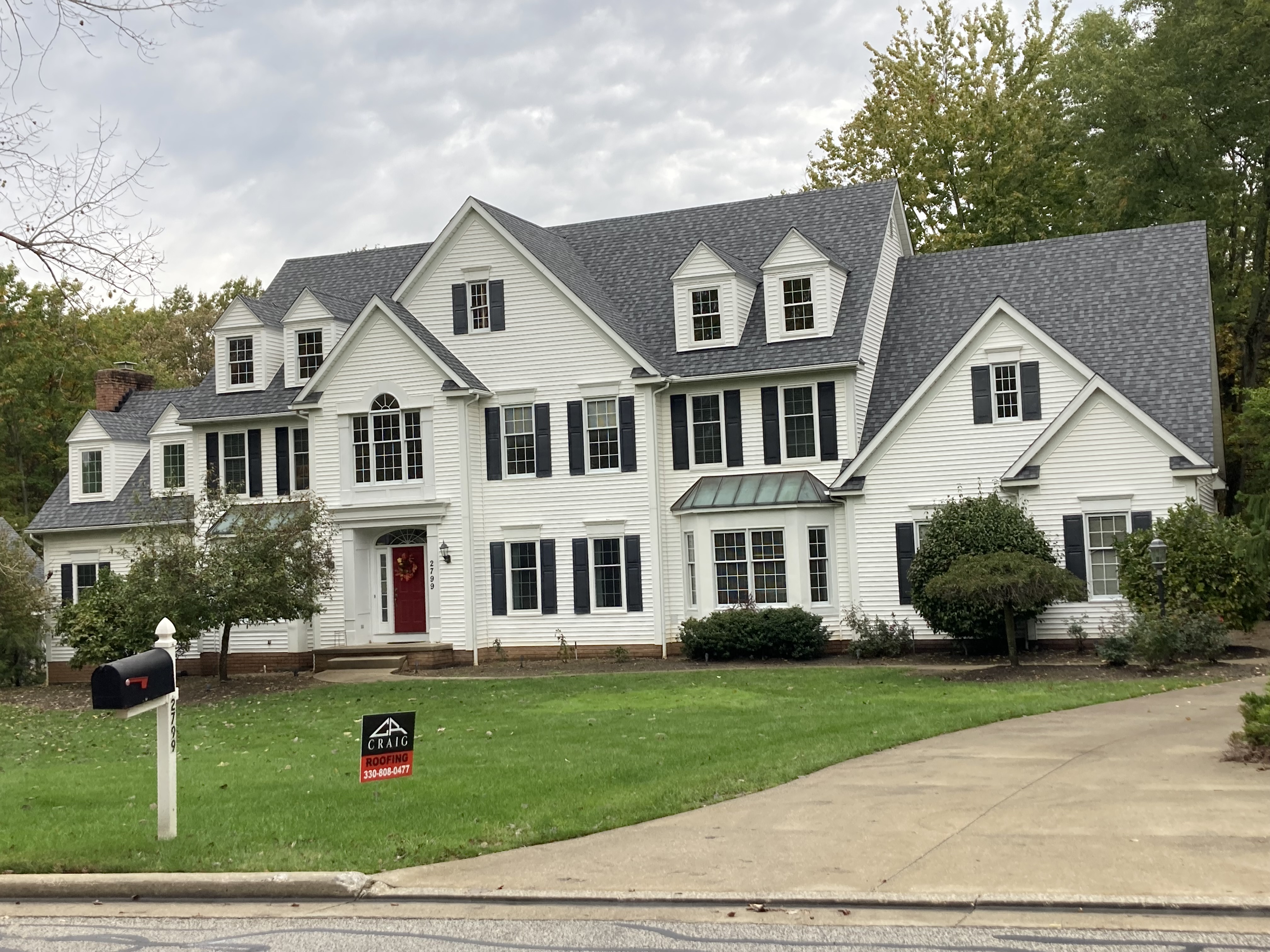 new roof on white house in akron ohio