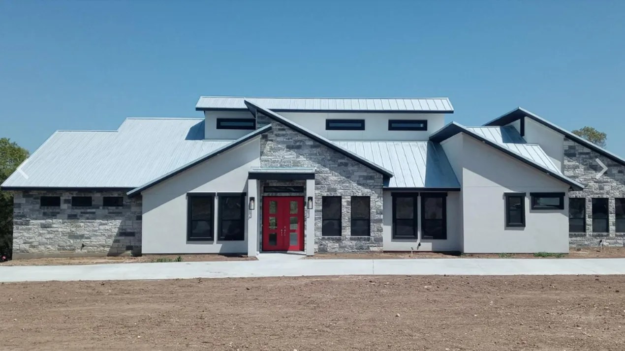 modern style home with red door
