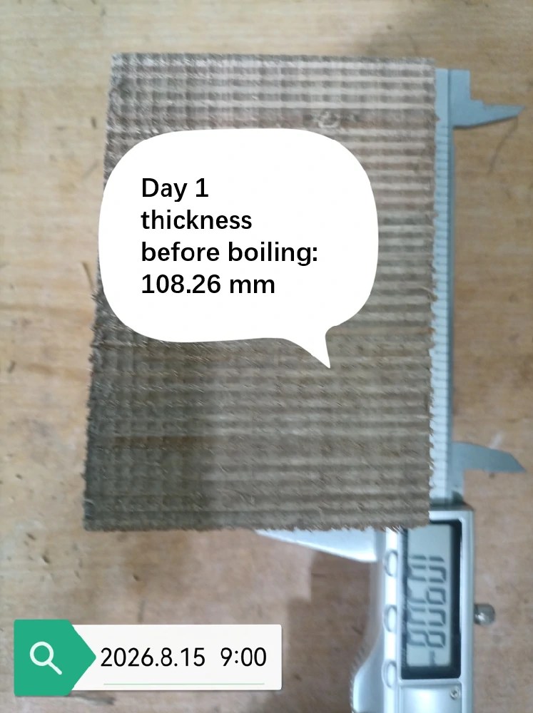 The plywood thickness was measured using an instrument, with the measurement taken on Day 1.