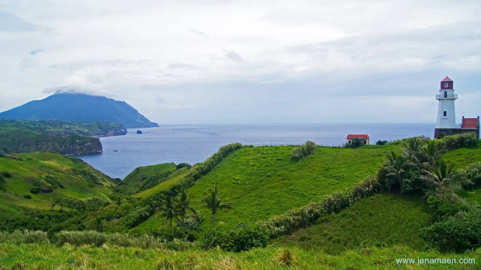 Beyond the Rolling Hills ft. Honest Batanes (Part 2) Lighthouse on the right overlooking the rolling hills of Batanes