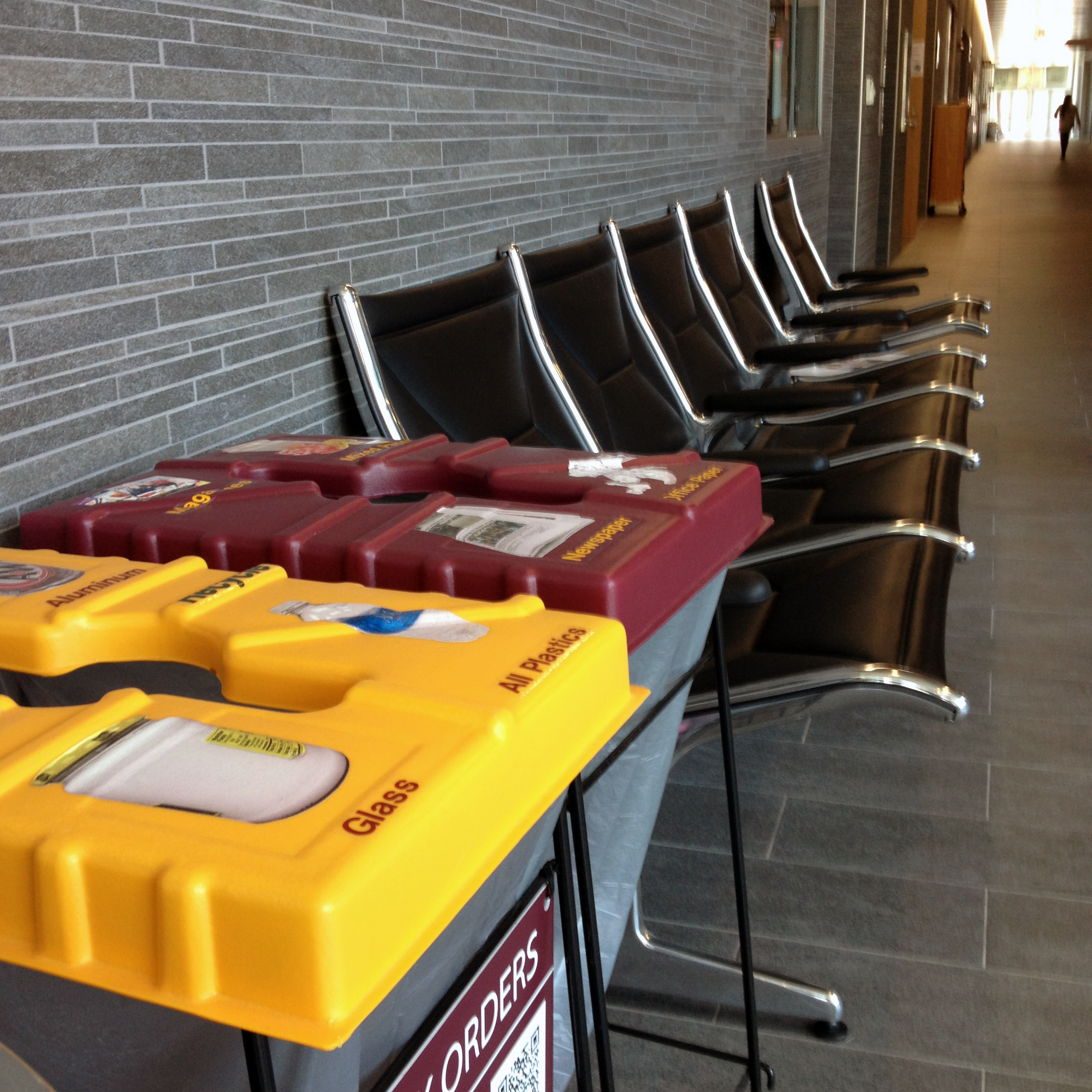 Maroon for paper and gold for bottles is different than your usually green for recycling. Around campus at Central Michigan University these bins are color coordinated with the school colors to uniquely help students recycle their waste items. Photo by: Jermaine Fields