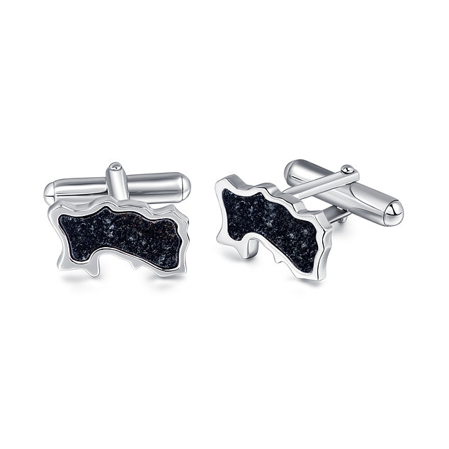 Hand-cut and polished Jersey black granite set in sterling silver Jersey-shaped cufflinks—18 x 11mm island size.