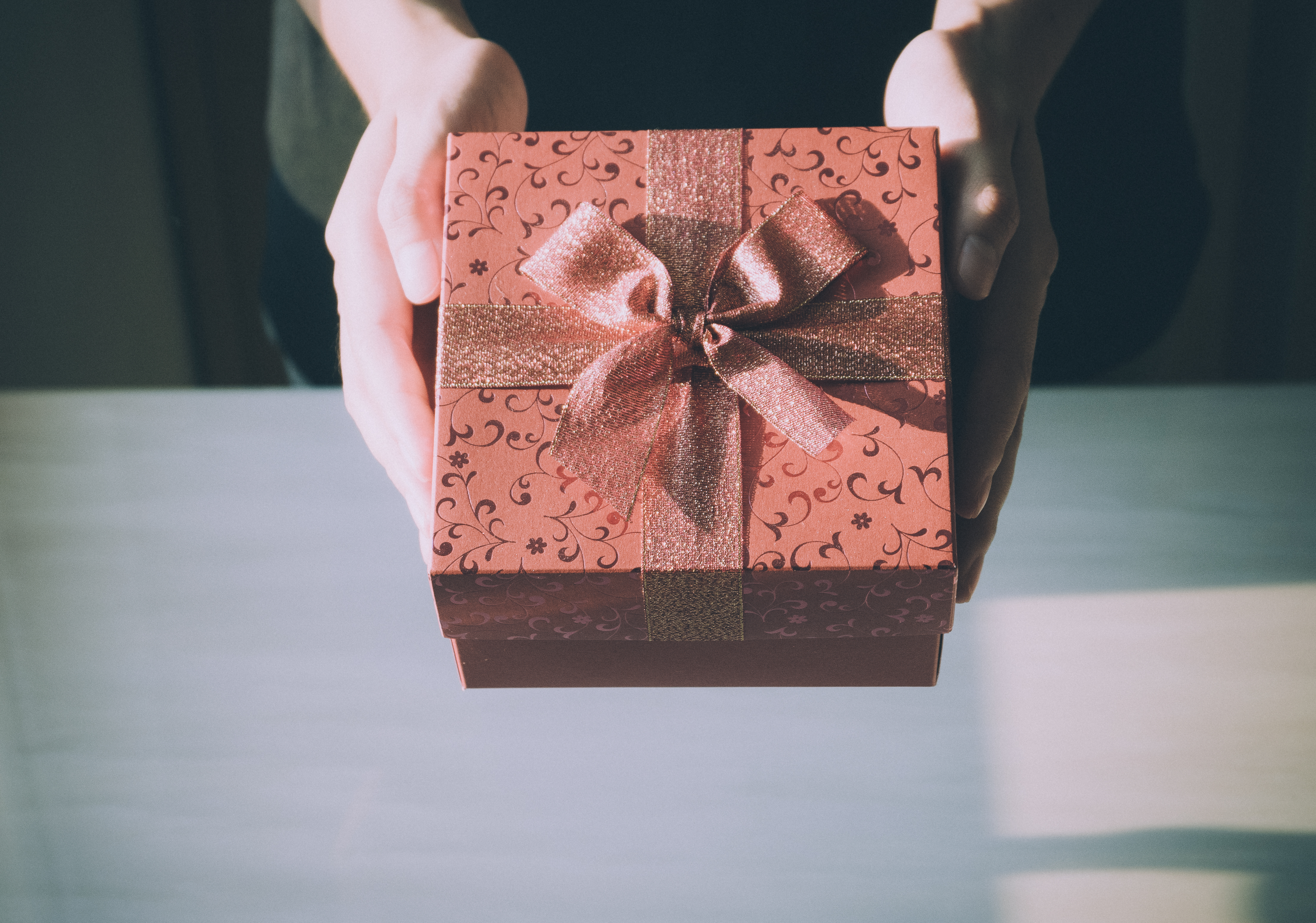 Photo by Porapak Apichodilok from Pexels https://www.pexels.com/photo/adult-birthday-birthday-gift-box-360624/
