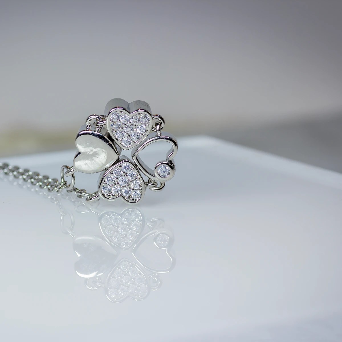Clover of Hearts Rhinestone Pendant in Silver