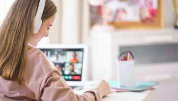 A woman participating in a remote learning session