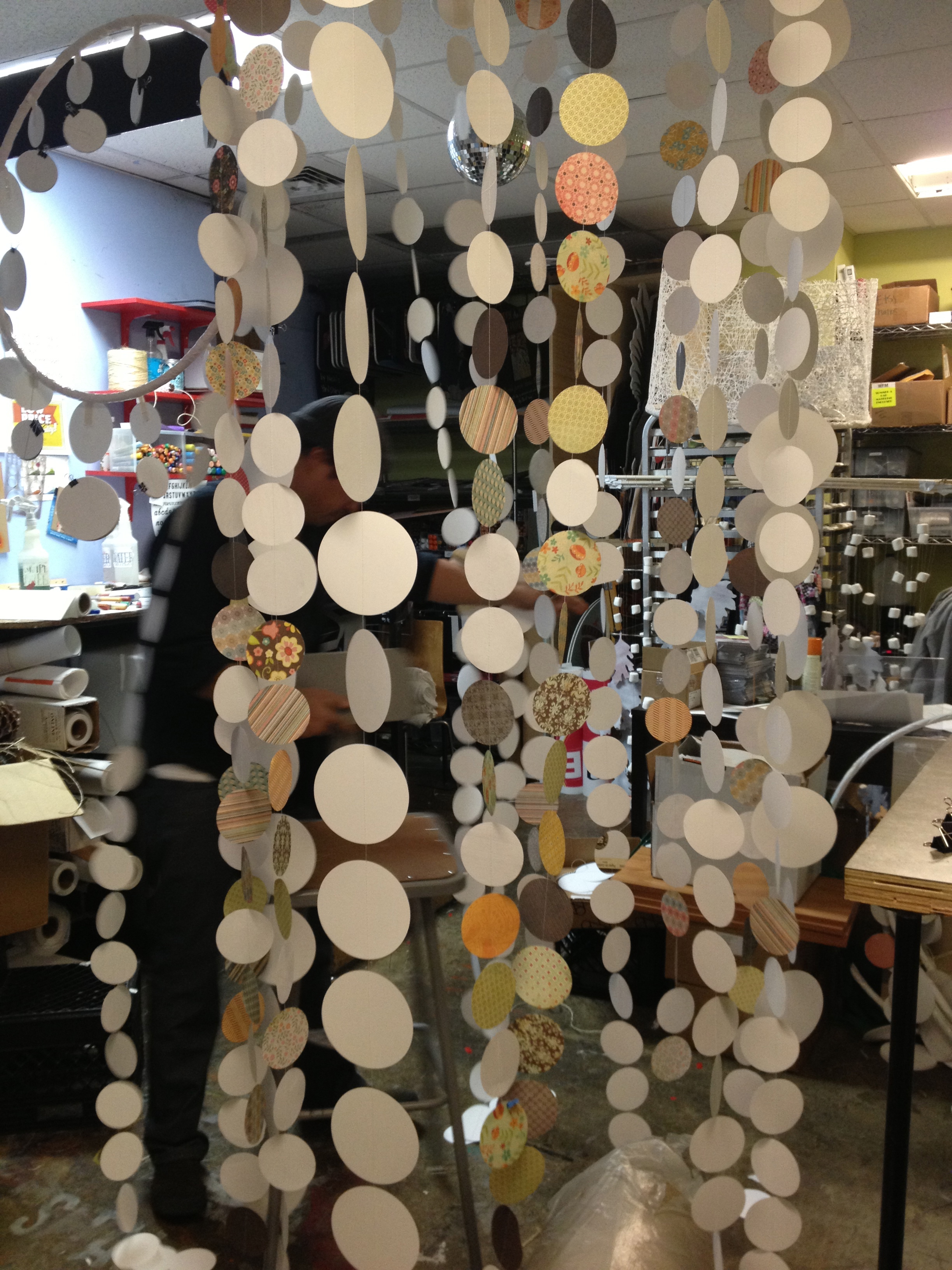 for days & days we sewed strands of circles to make several hanging chandeliers.