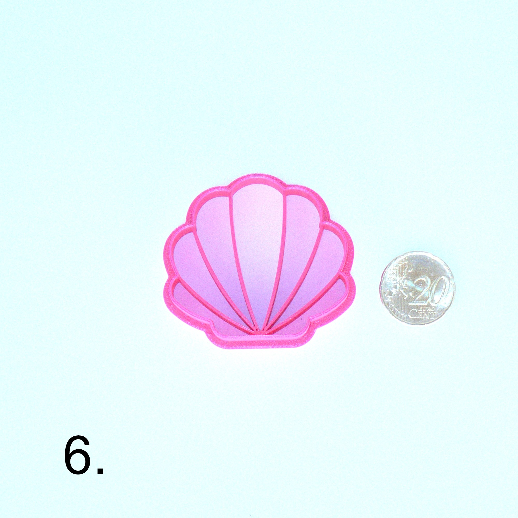 Simpukan muotoinen askartelumassaleikkuri