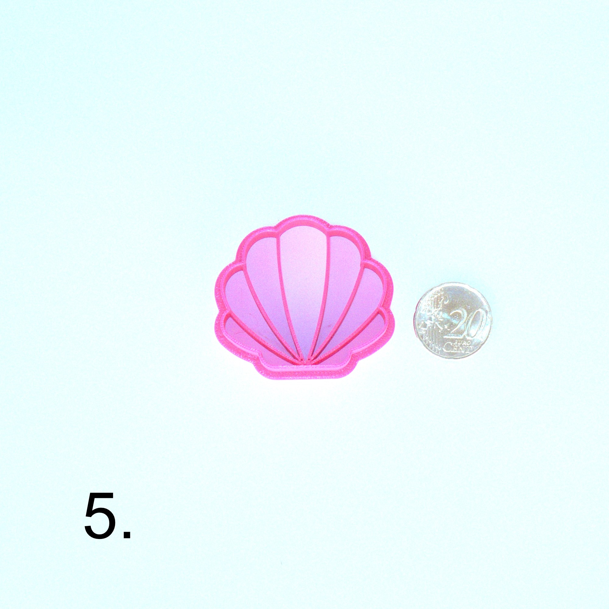 Simpukan muotoinen askartelumassaleikkuri