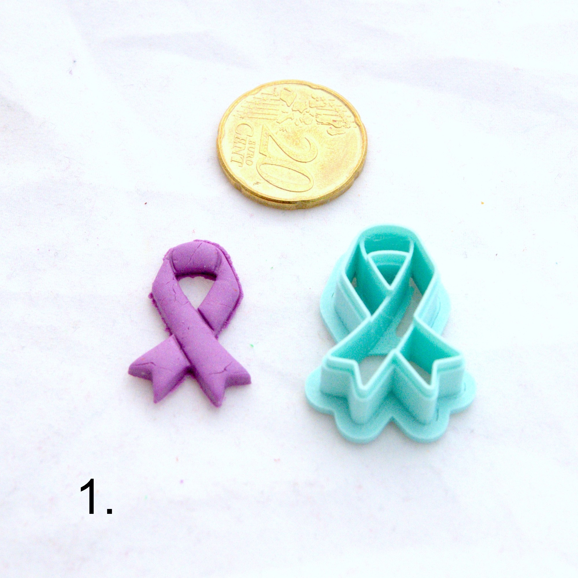 Tietoisuus- / tukinauhaleikkuri