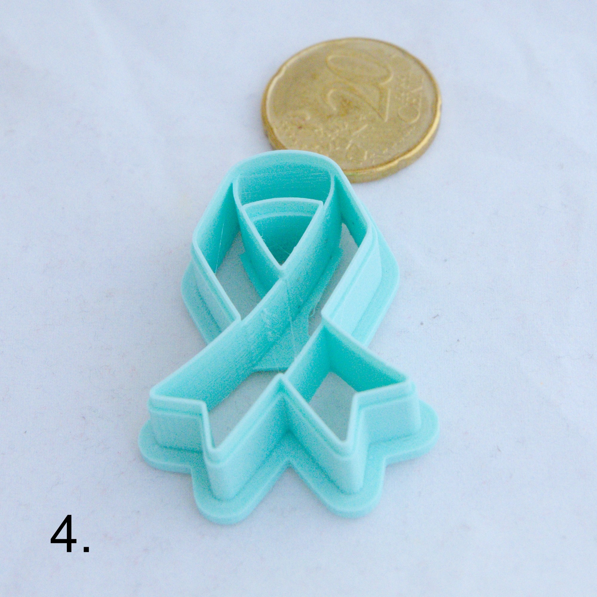 Tietoisuus- / tukinauhaleikkuri