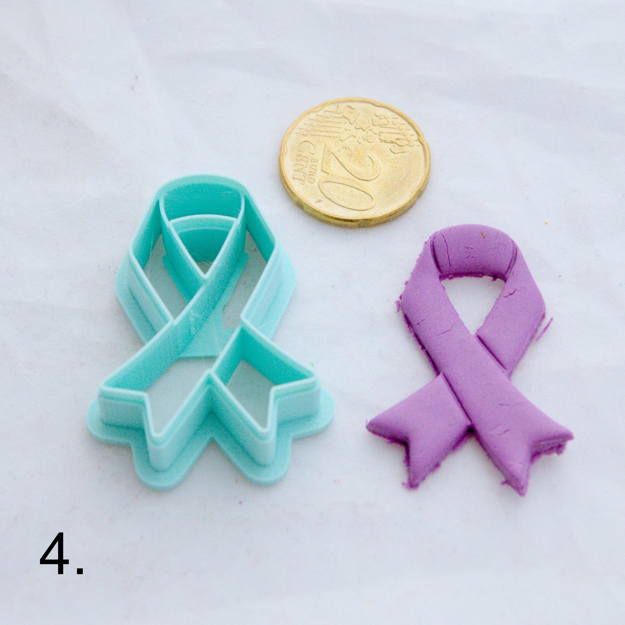 Tietoisuus- / tukinauhaleikkuri