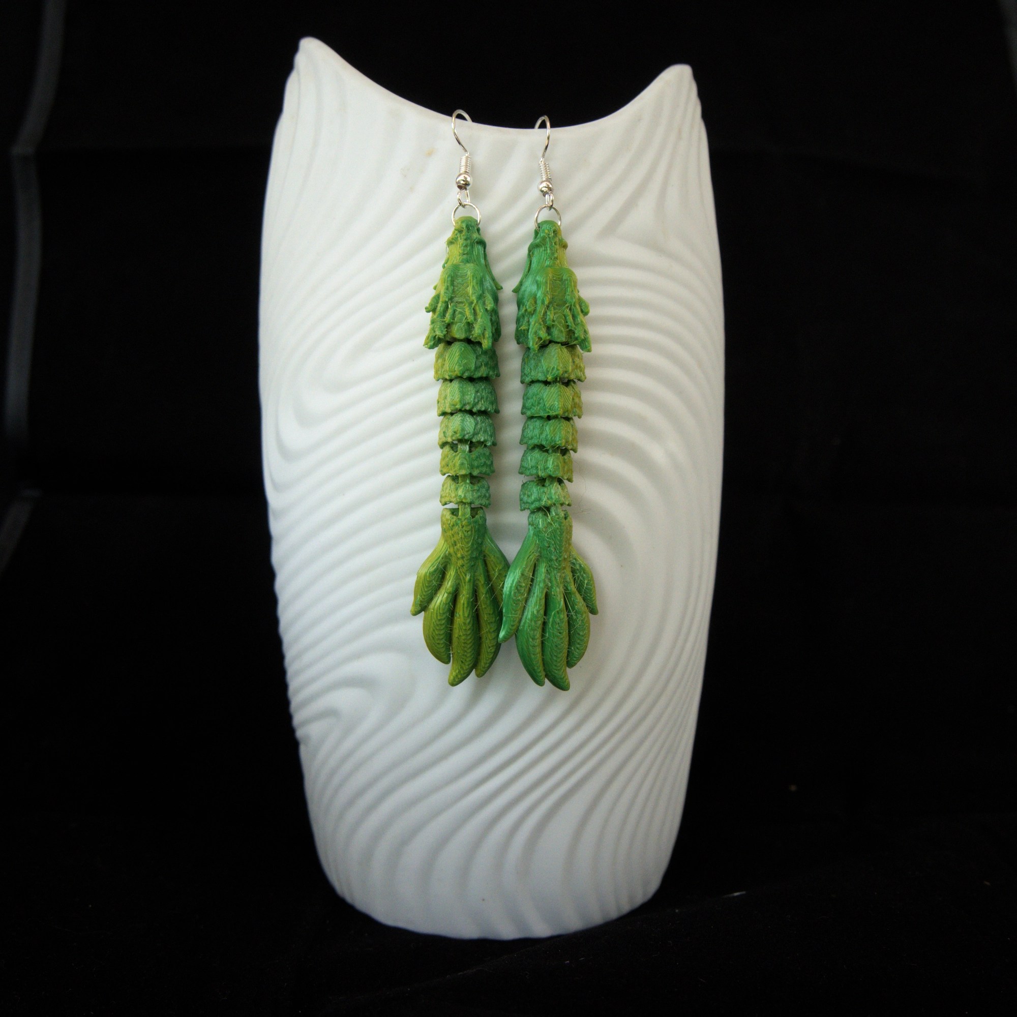 keltavihreä lohikäärmekorvakorupari