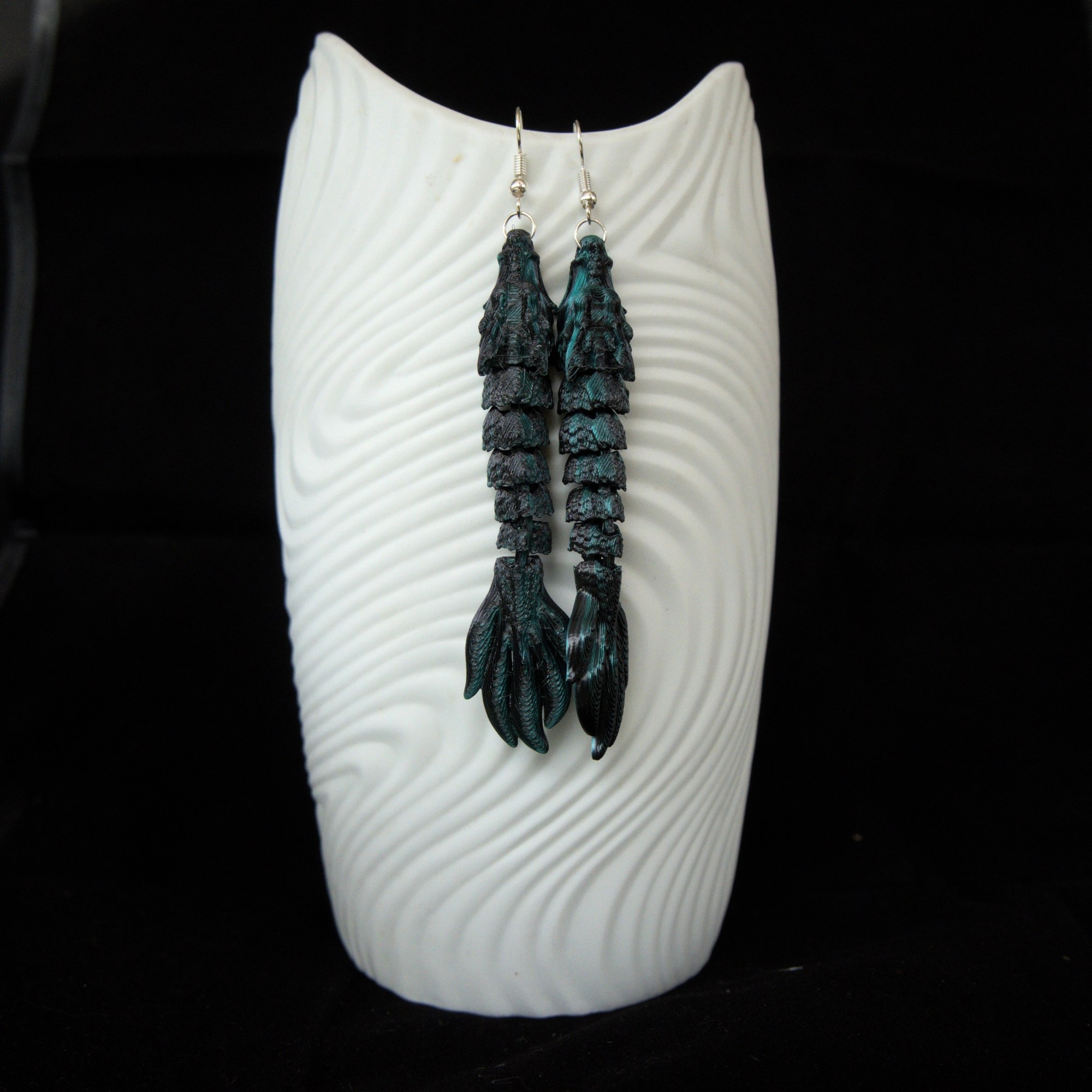 mustaturkoosi lohikäärmekorvakorupari