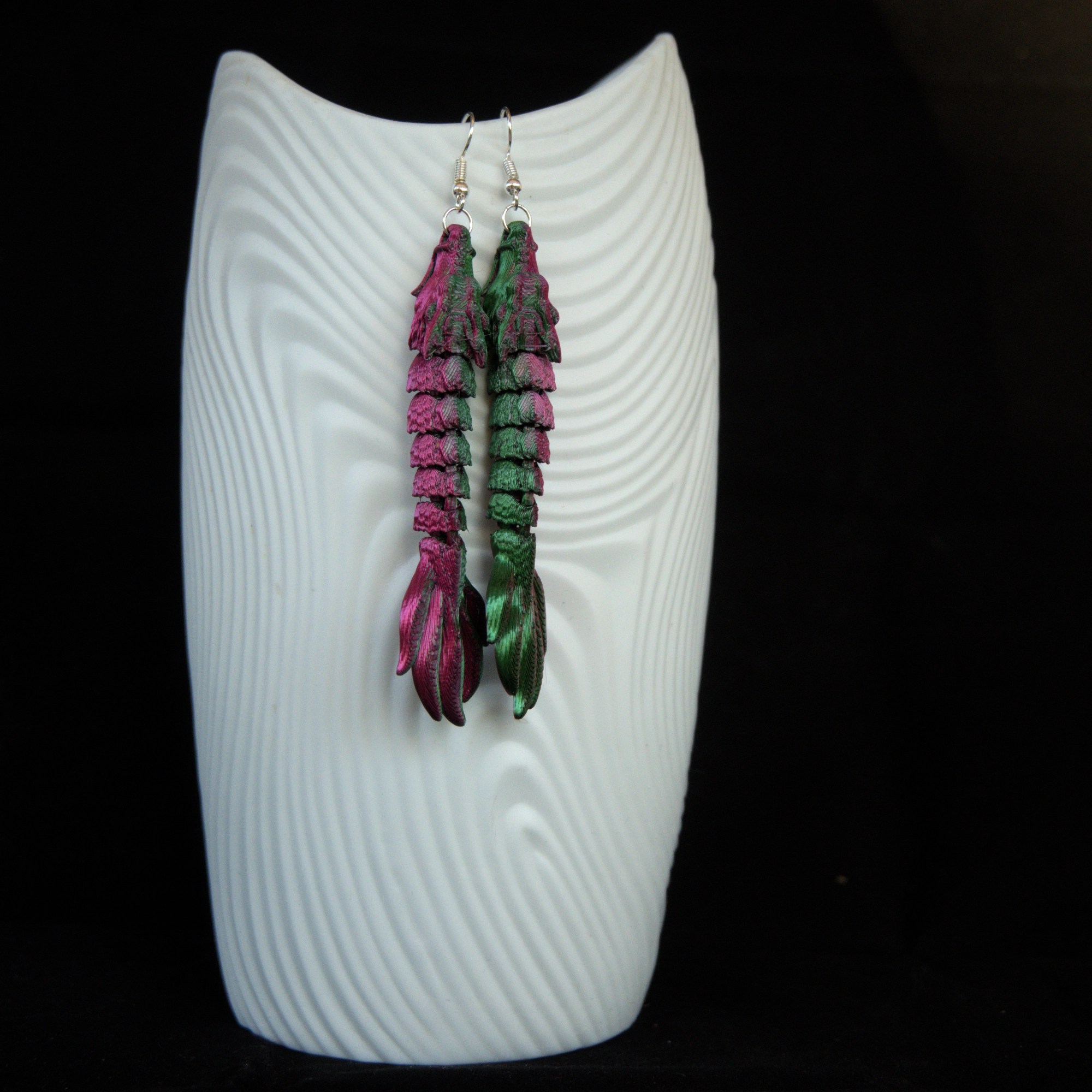 punavihreä lohikäärmekorvakorupari