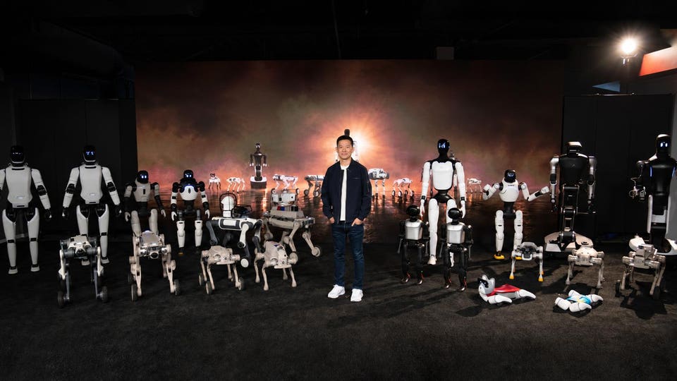 Faraday Future global CEO YT Jia with the company's new robots