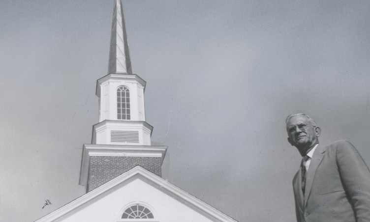 RM Bell w/ Alumni Chapel steeple in the background