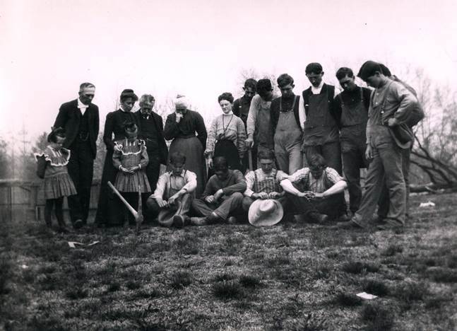 The Johnsons and students gather for prayer