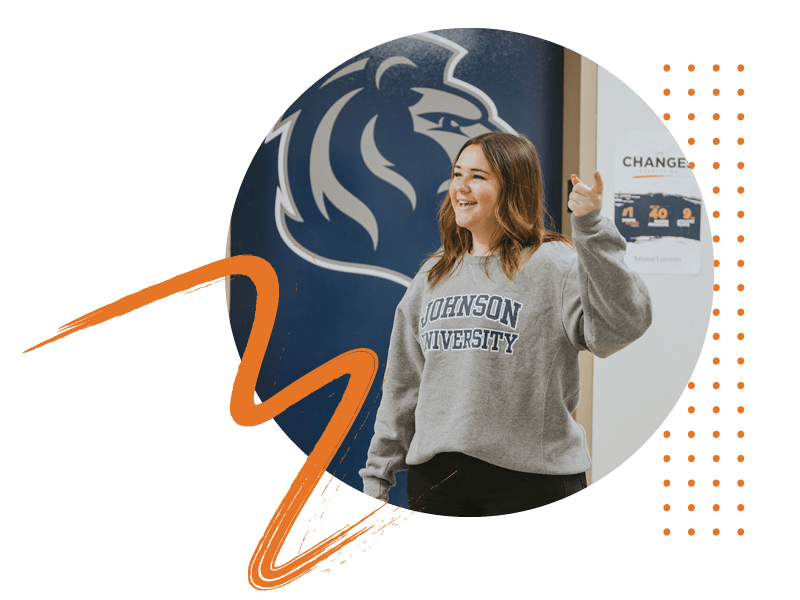 Preview Day-Johnson University tour guide. shows future students around campus