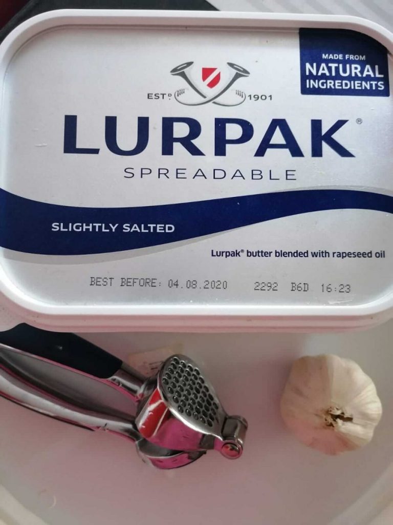 The ingredients needed to make garlic butter as part of five frugal things.