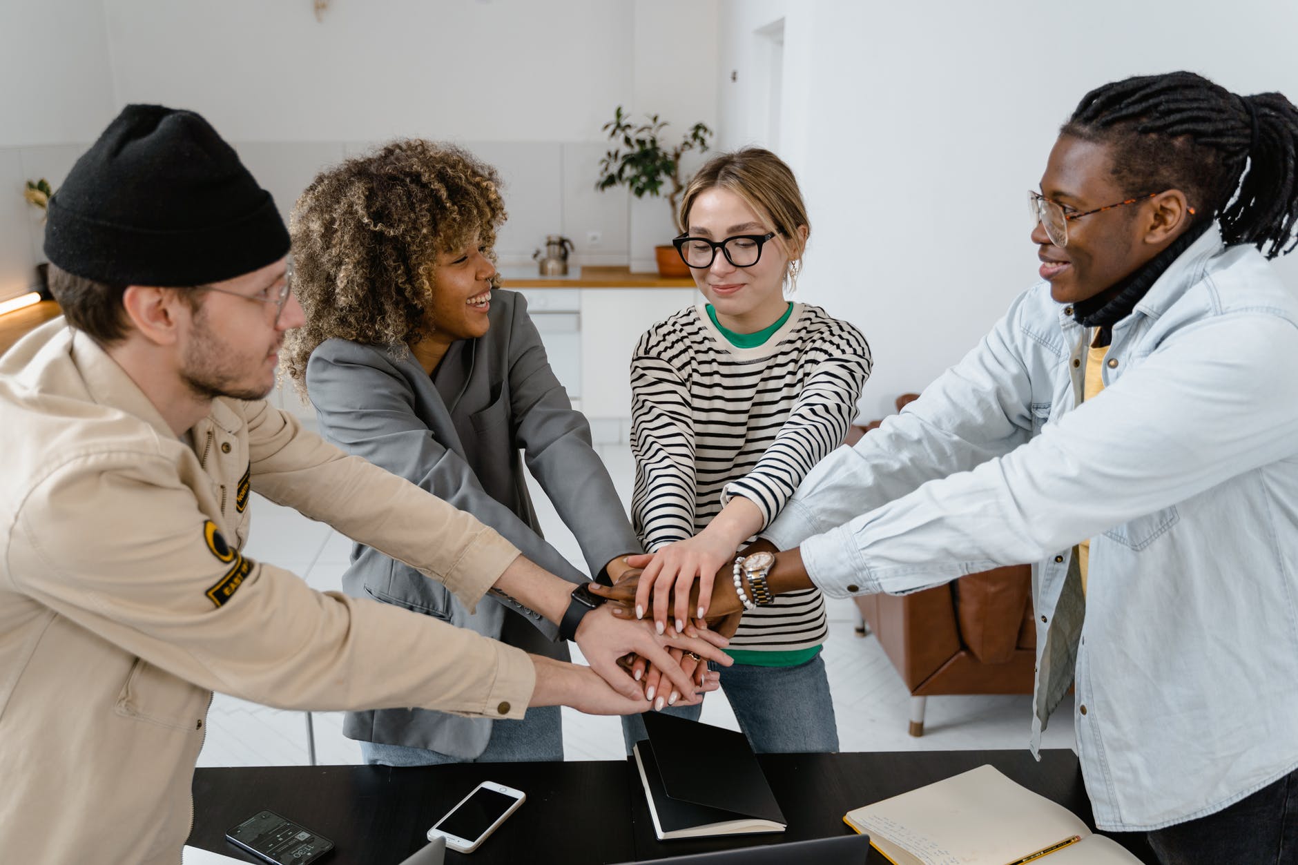 man standing in front of group of men