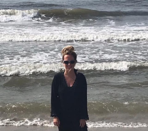 woman standing dressed up in a sea, woman healed after trauma, on PTSD My Story Project on Journeoyofsmiley Blog