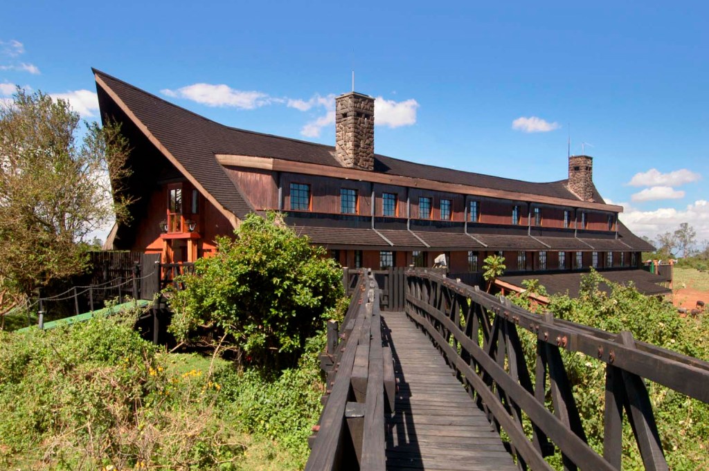 Ark Lodge set against a stunning backdrop, highlighting its unique structure.