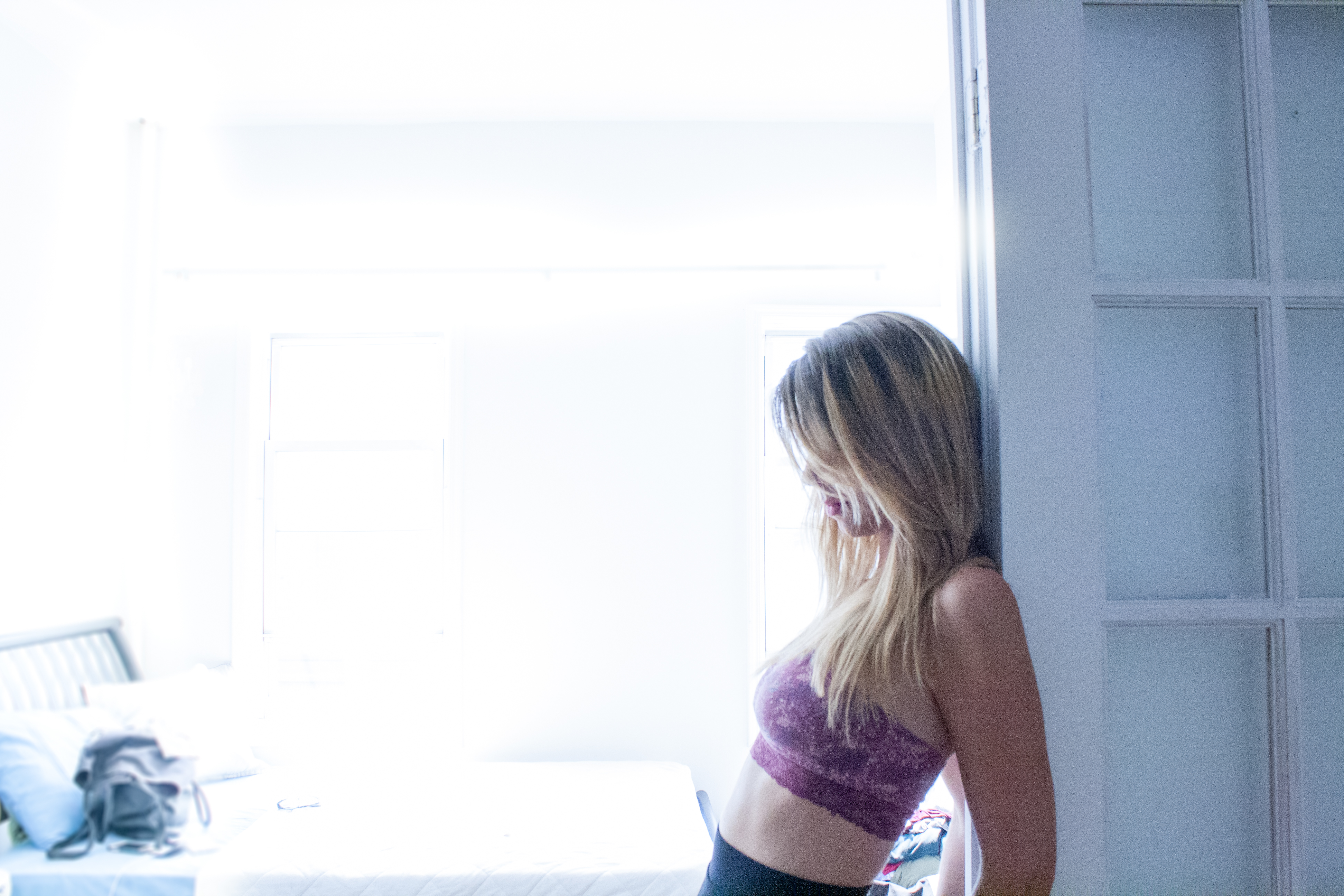 Beautiful side full body profile with bright light behind.