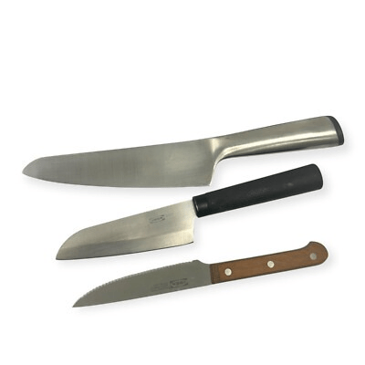 An image of three knives next to one another, a chef's knife, a paring knife, and a hybrid between the two. What is a chef's knife?